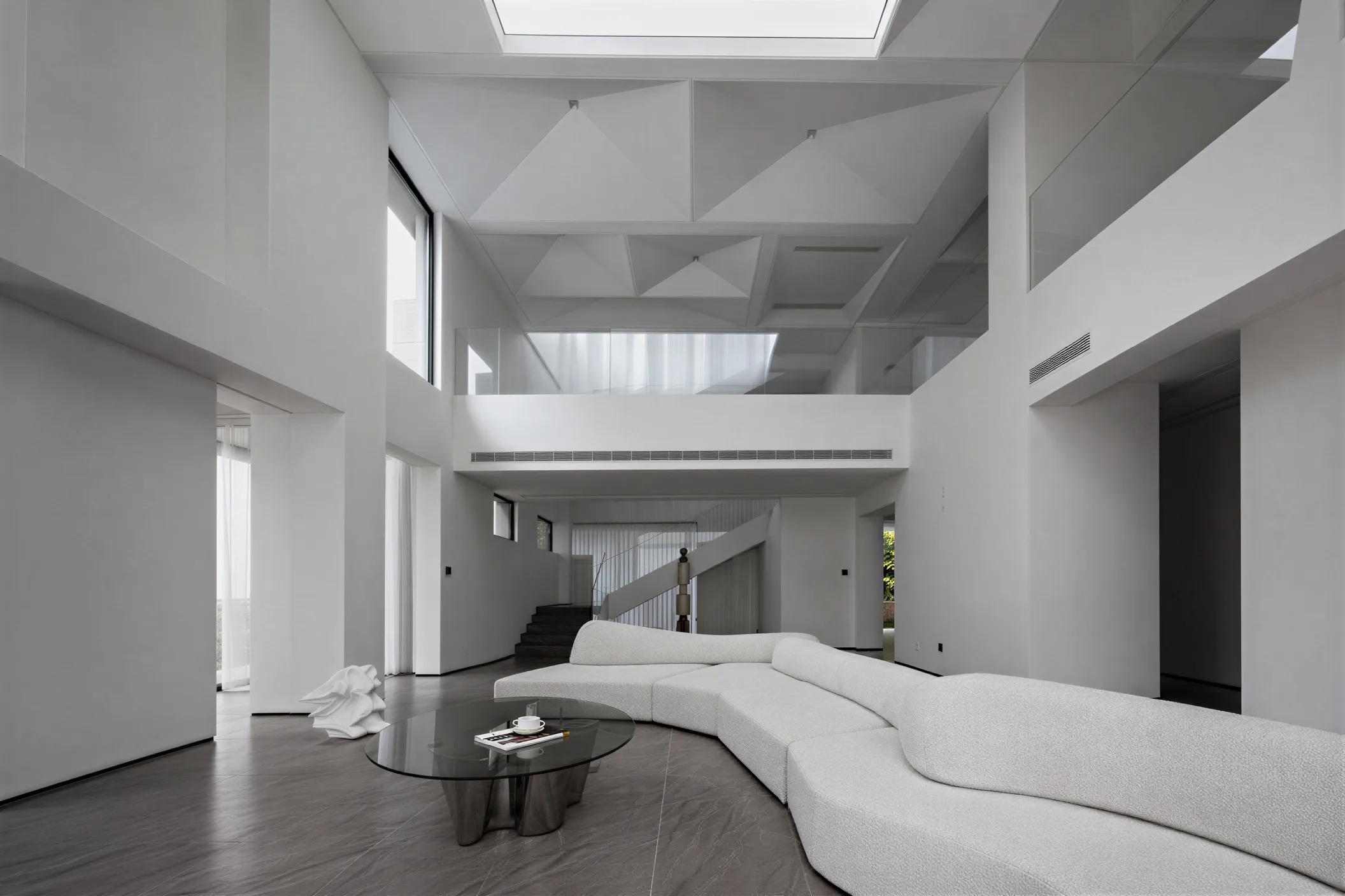 Commercial interior showing customer circulation and staff work areas